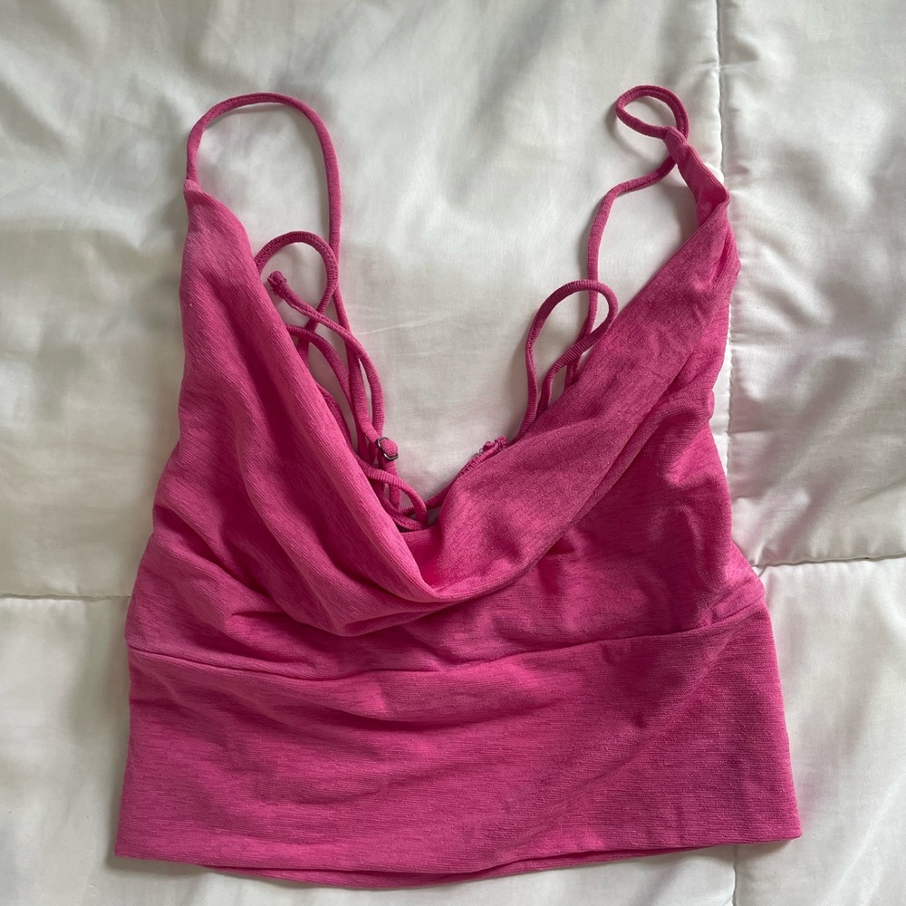 Urban outfitters pink lace-back crop top.
